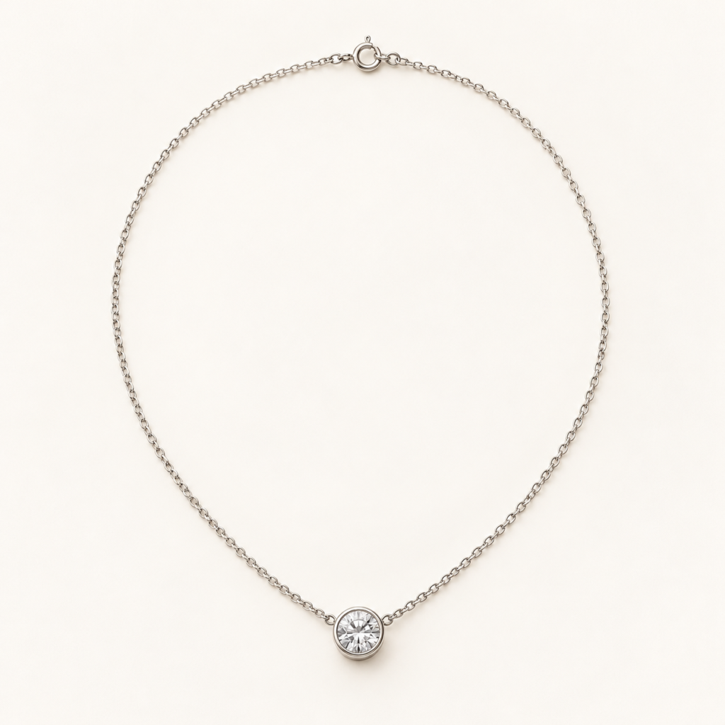 Orbit Pendant Necklace on an ivory background