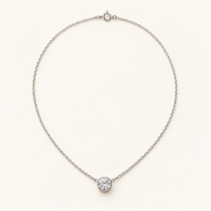 Orbit Pendant Necklace on an ivory background