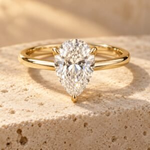 The Amara ring on warm cream travertine