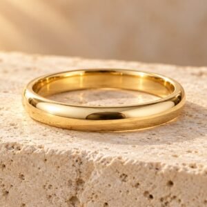The Amour ring on warm cream travertine