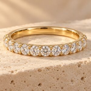 The Éternelle ring on warm cream travertine