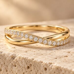 The Étreinte ring on warm cream travertine
