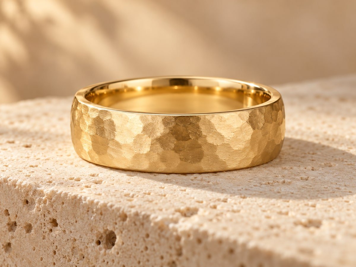 The Union ring on warm cream travertine
